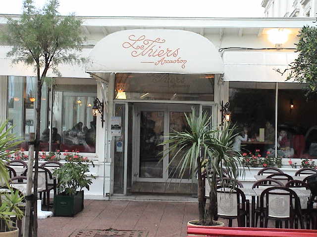 A couple dining in a restaurant; Actual size=240 pixels wide